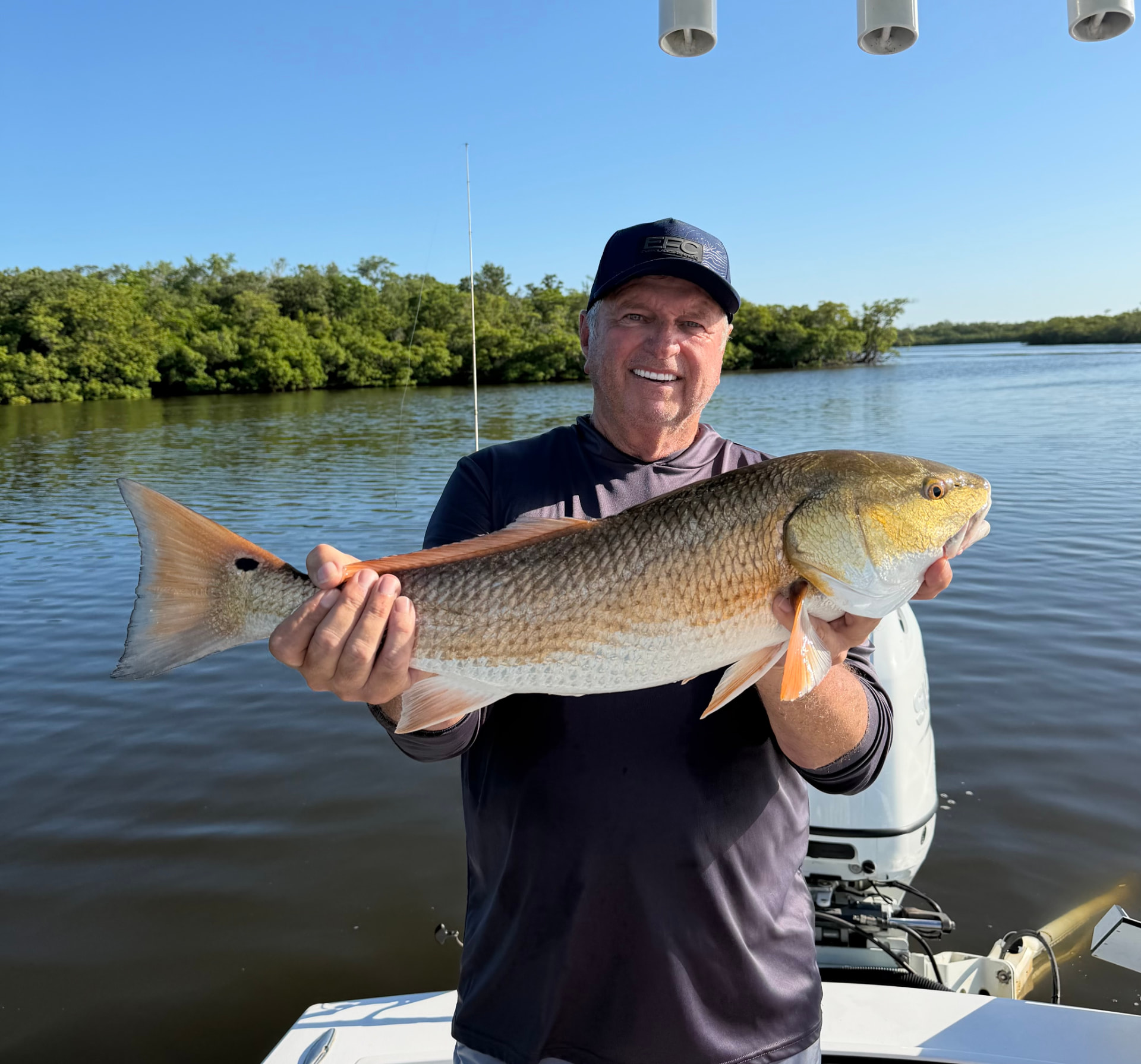 Big redfish caught on a Naples fishing charter