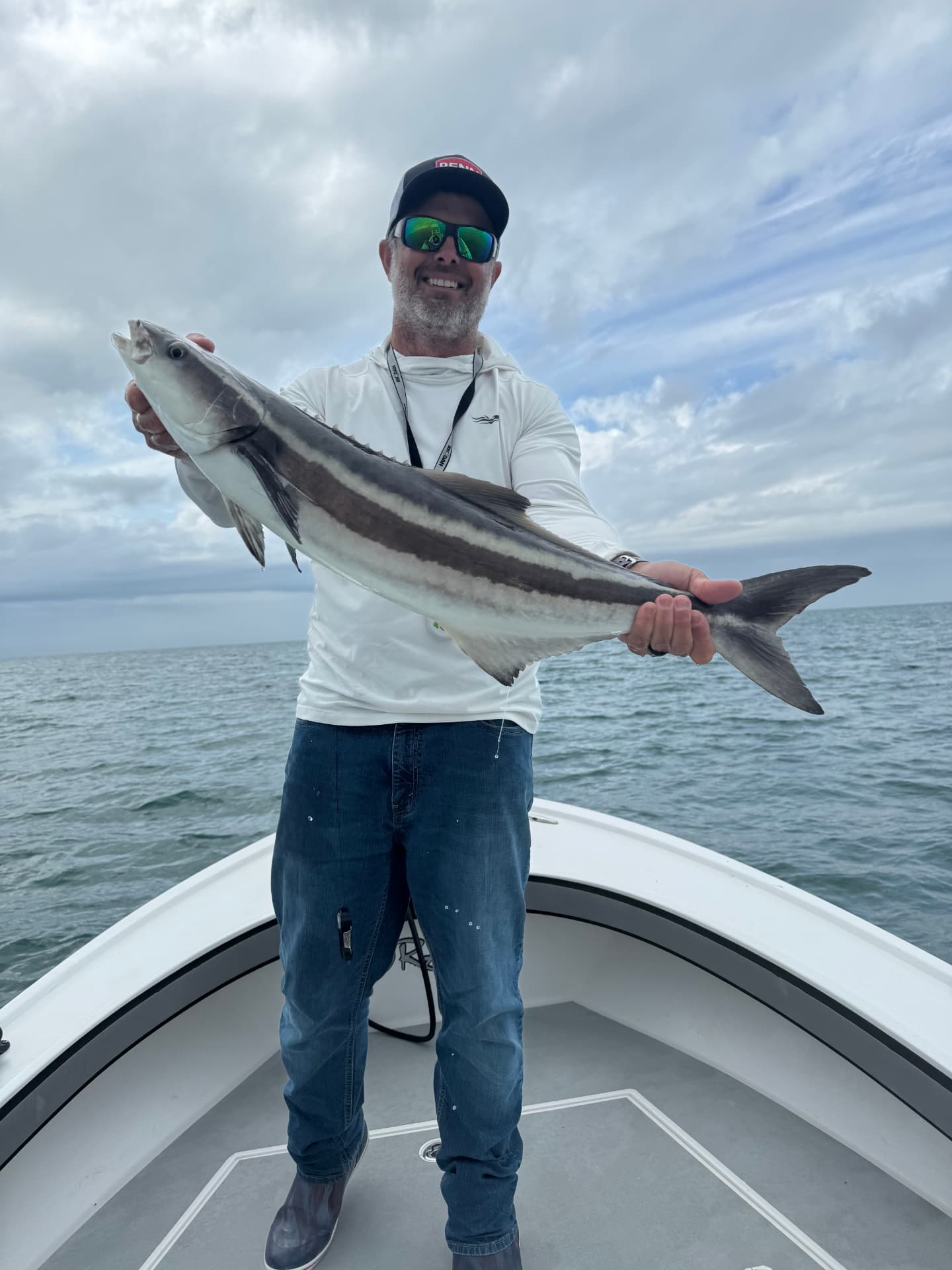Angler with a large cobia caught off Naples, Florida